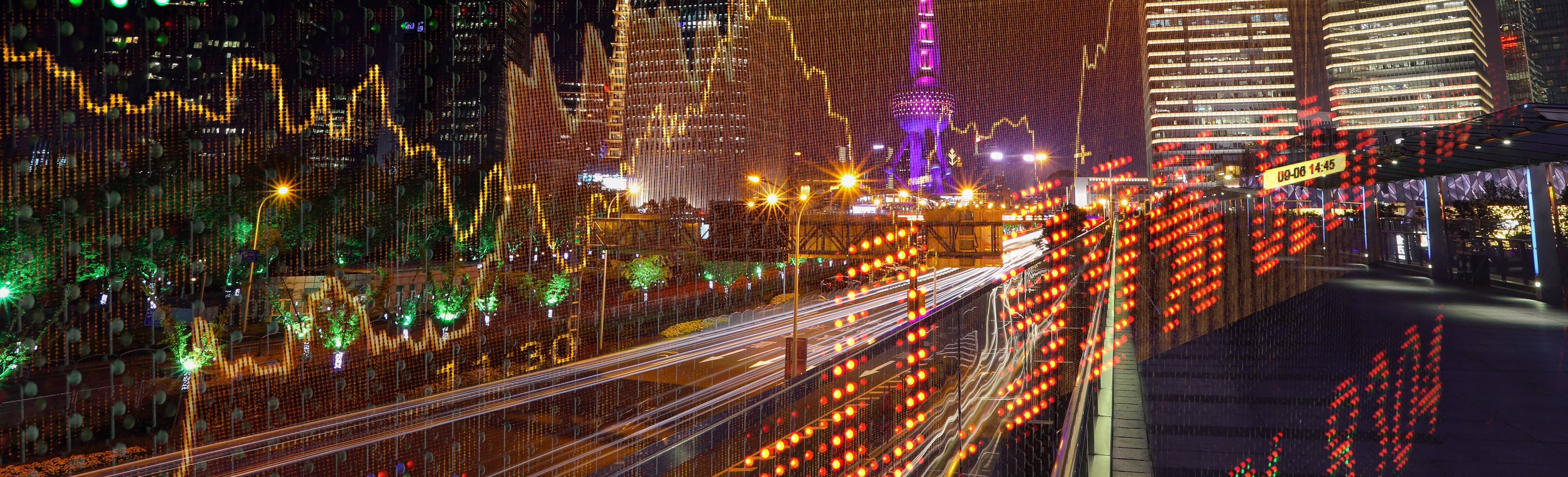 stock ticker on top of cityscape