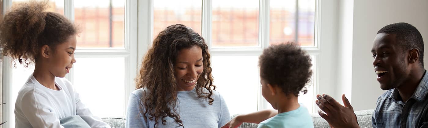 Family opening financial gifts on Christmas 