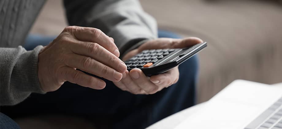 Man used calculator for his finances.