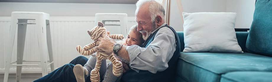 grandfather playing with grandchild
