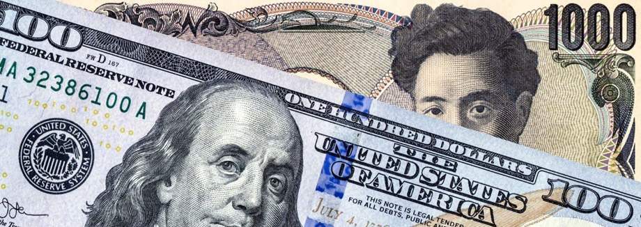 Japanese yen banknote and american dollar.