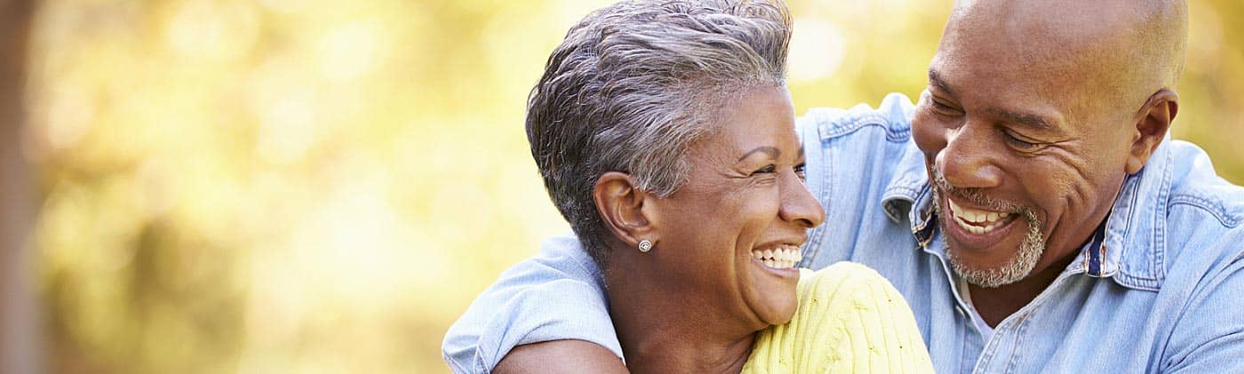 Mature couple relaxing outdoors in the fall: Social Security