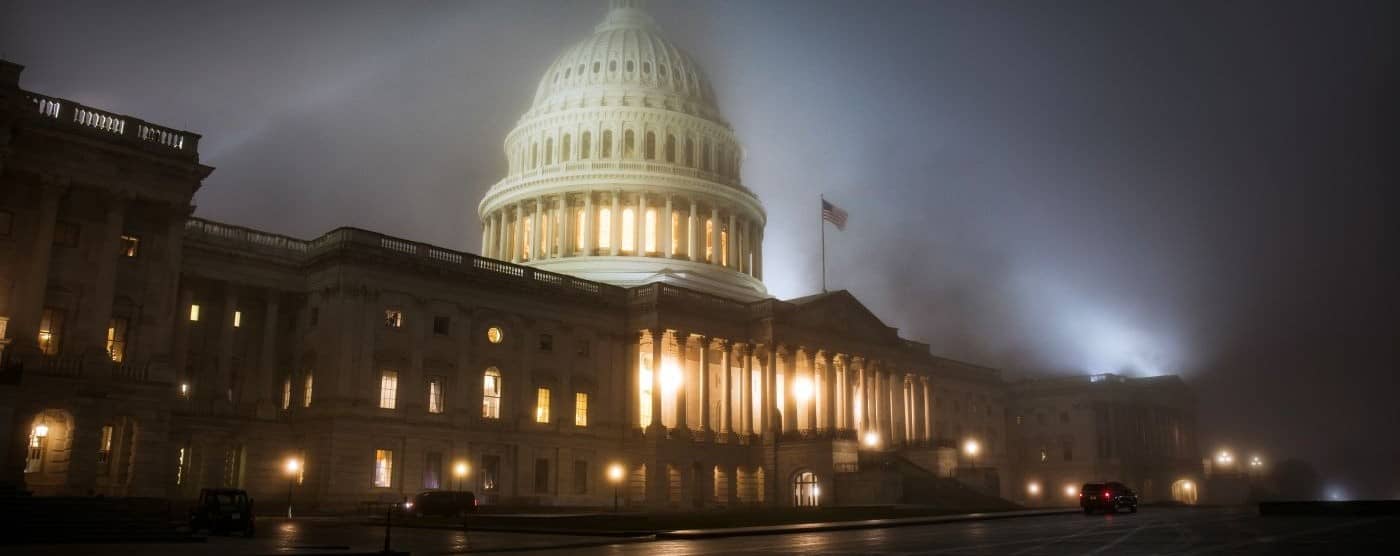 US Capitol Building in dramatic fog.