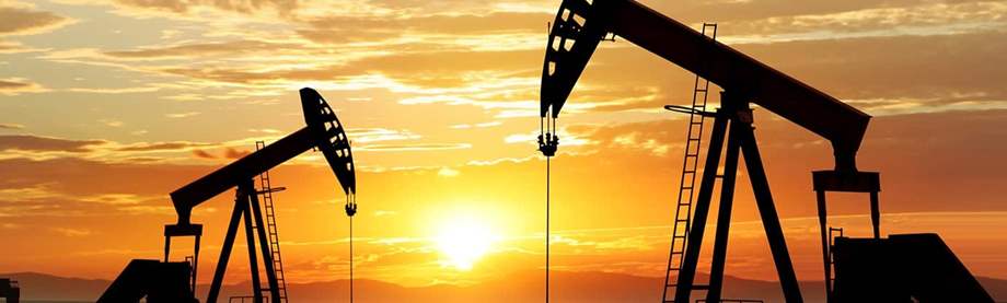 oil pumps at sunset