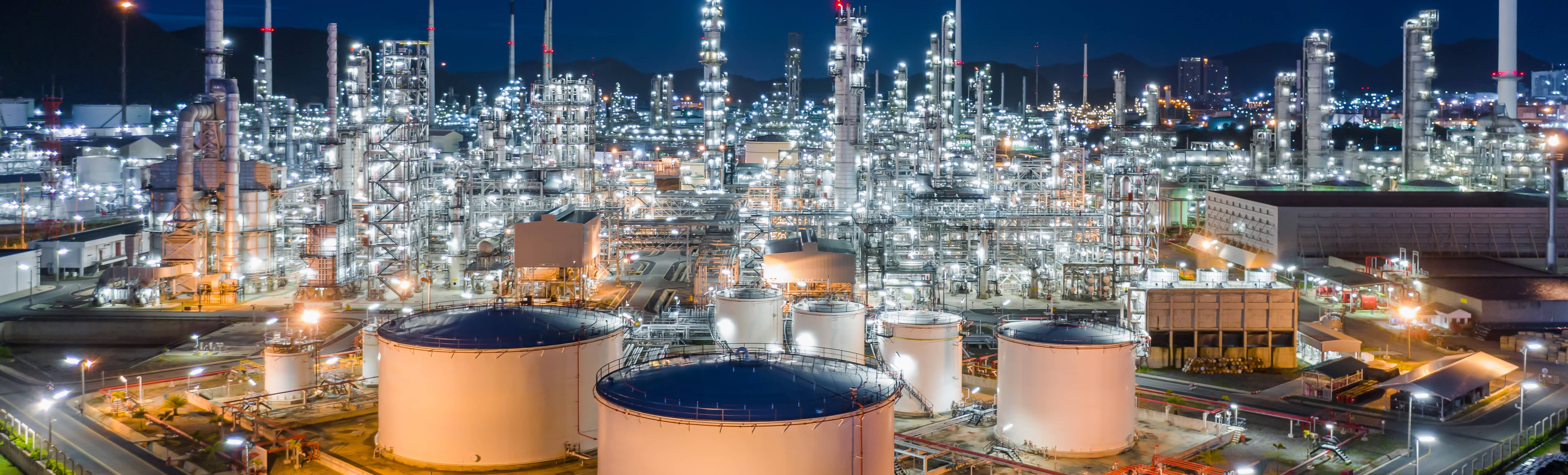 photo of oil refinery at night