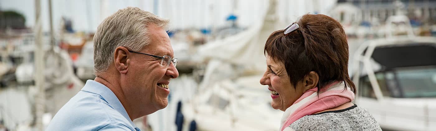 One woman smiles with her husband after becoming a joint annuitant 