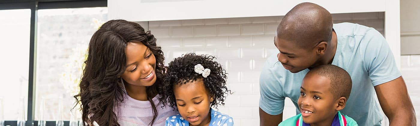 parents help their two kids with homework and wonder if they should save for retirement or college