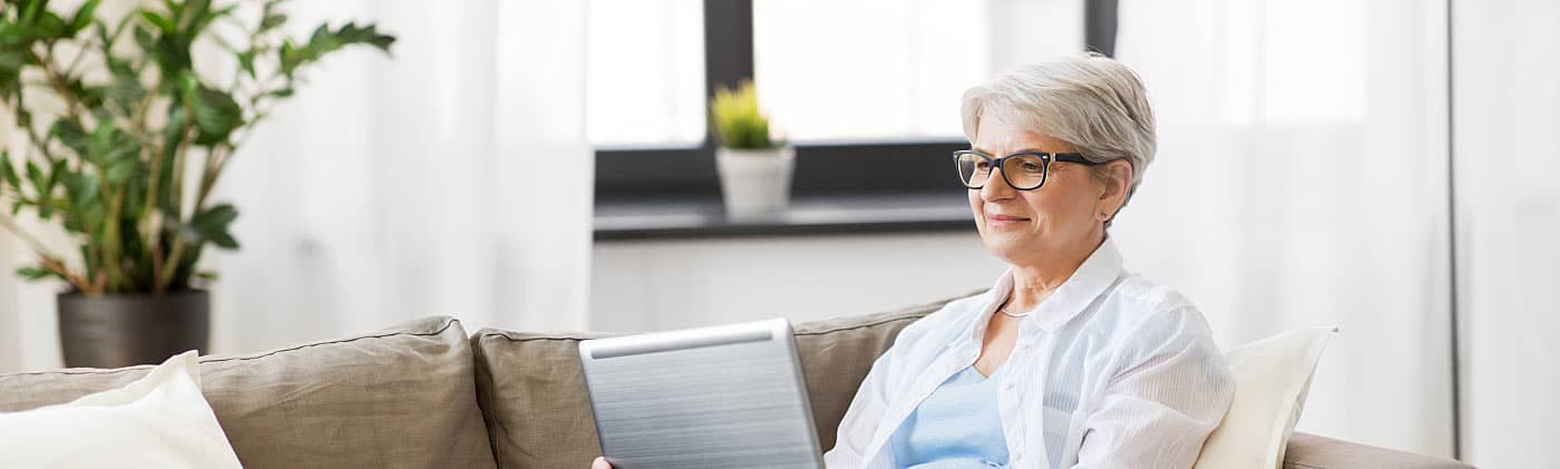 Person researching index funds at home 