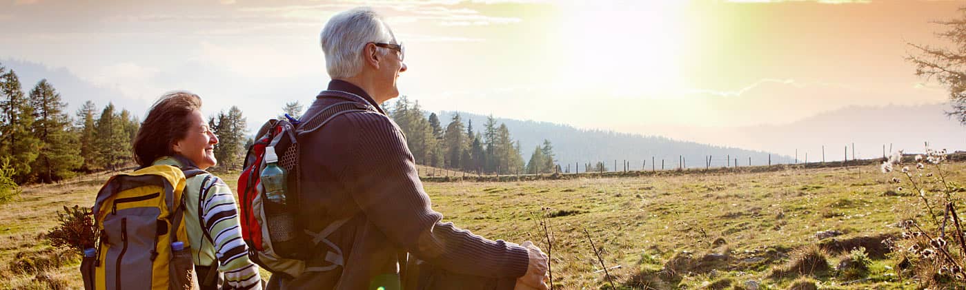 Retirees who receive an immediate annuity taking a break from hiking 