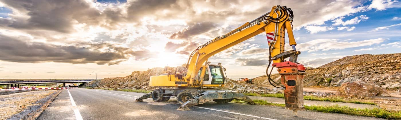 pneumatic hammer breaking asphalt