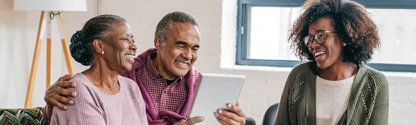 Senior couple discussing options how living benefits could help protect your future