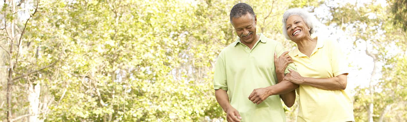 Older couples, like this one walking outside, should be aware of different types of financial fraud