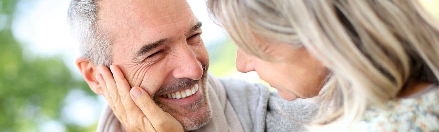 Smiling senior couple: medicare supplement insurance