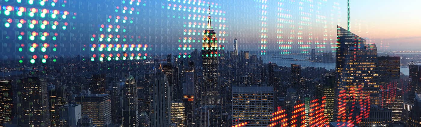 Stock ticker over skyline