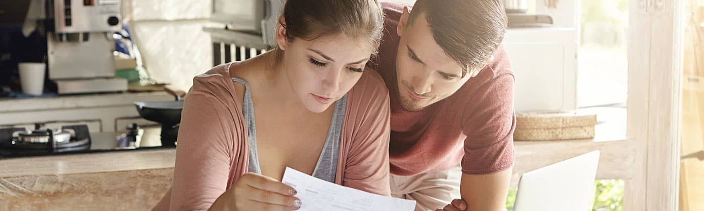 Woman working on personal financial planning with a laptop 