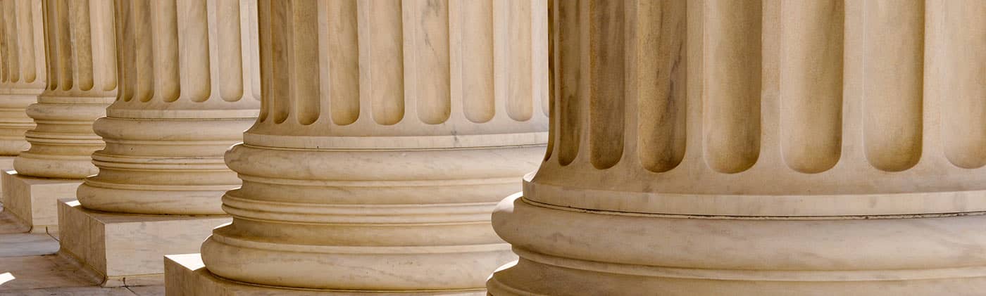 Row of columns on building