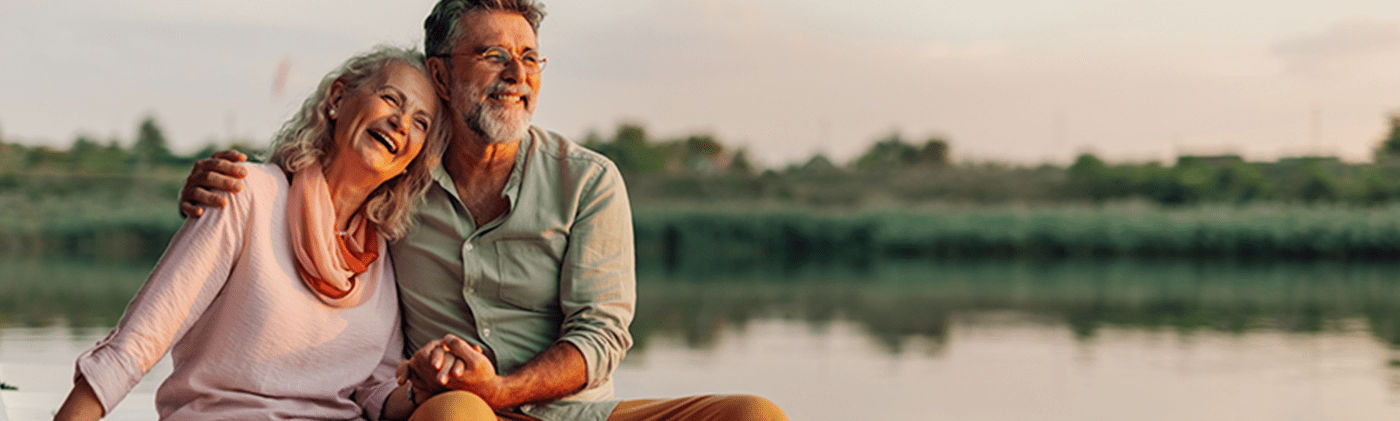 Confident retired couple enjoying stability and flexibility of Indextra annuity