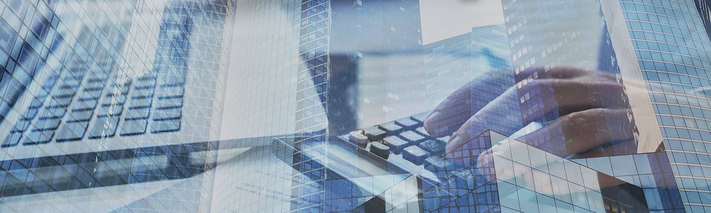 financial banner image with hand on keyboard