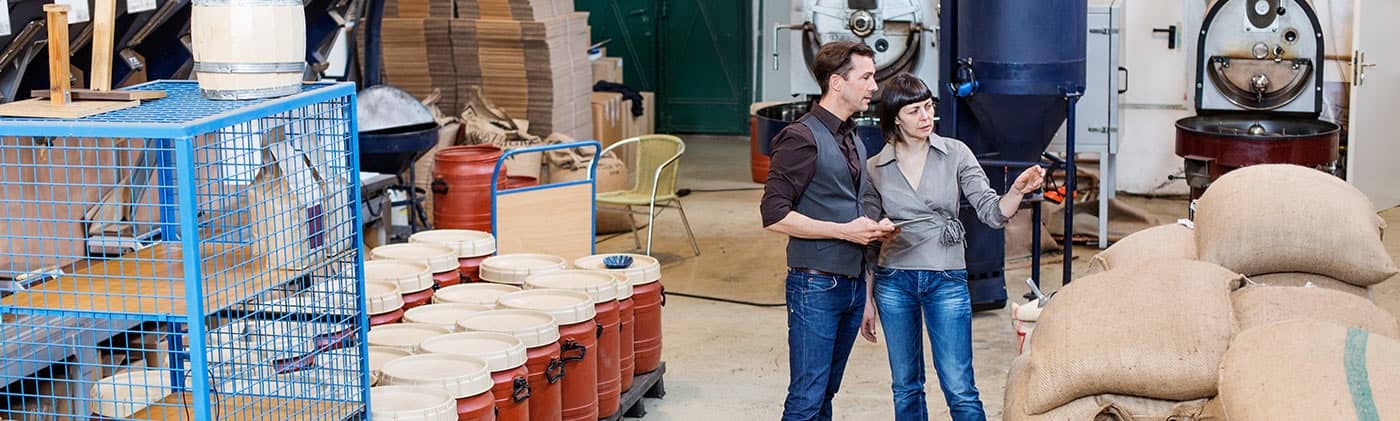 Customers of pension risk transfer working in warehouse