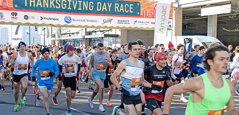 Thanksgiving Day Race runners start