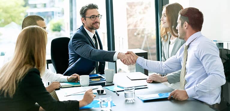 Business partners shaking hands