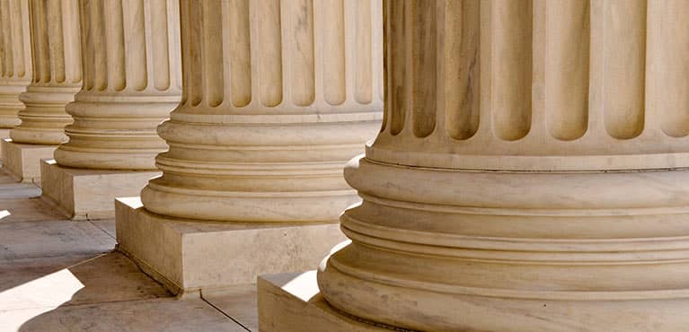 Row of columns on building