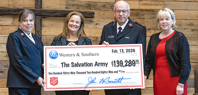 Western & Southern and Salvation Army leaders present Crib of the Nativity donation check supporting Greater Cincinnati families