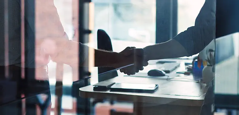 handshake in conference room