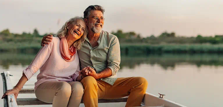 Confident retired couple enjoying stability and flexibility of Indextra annuity