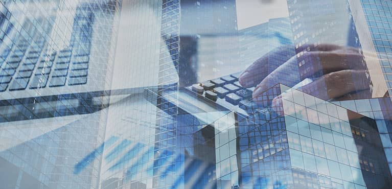 financial banner image with hand on keyboard