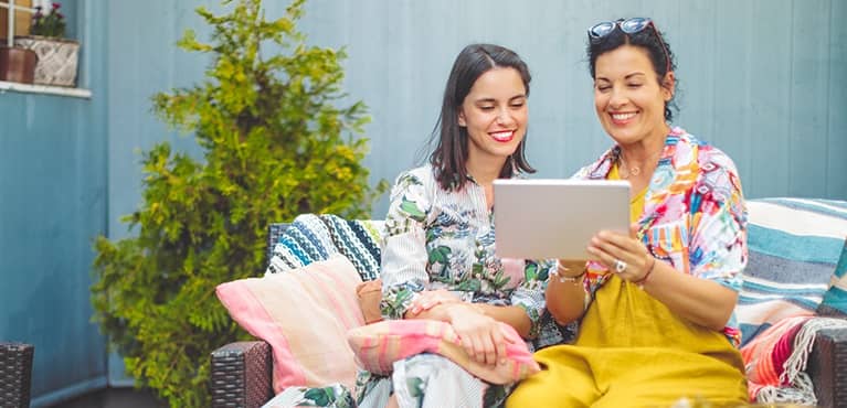 Mother daughter sharing screen