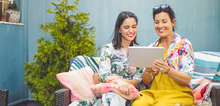 Mother daughter sharing screen