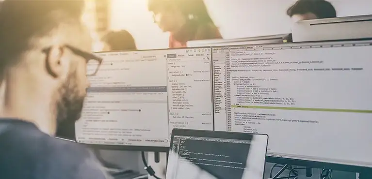 Programmer at computer