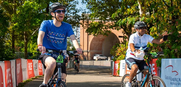 Community leaders and partners gather to celebrate Ride Cincinnati’s record-breaking $2.1 million fundraising milestone supporting cancer care at the newly unveiled Cincinnati Cancer Foundation offices in Greater Cincinnati.