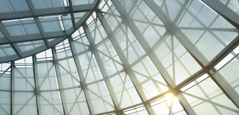 sun shining through skyscraper