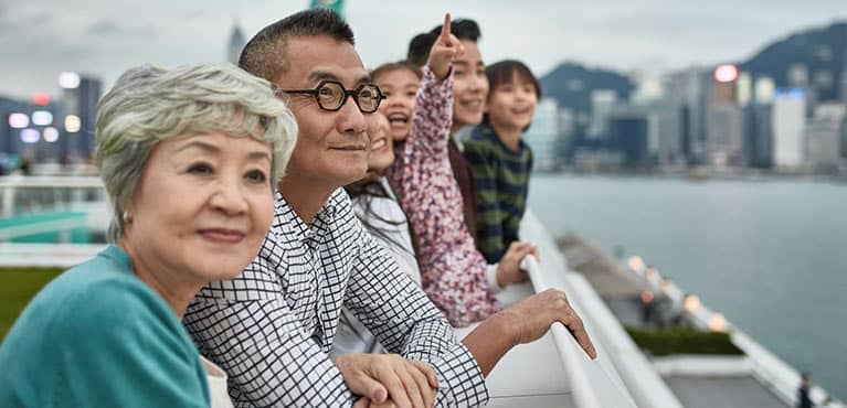 family-overlooking-river