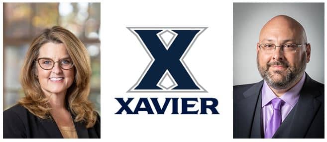 Xavier University President Colleen Hanycz, Williams College of Business Dean Marco Pagani, with the Xavier University logo