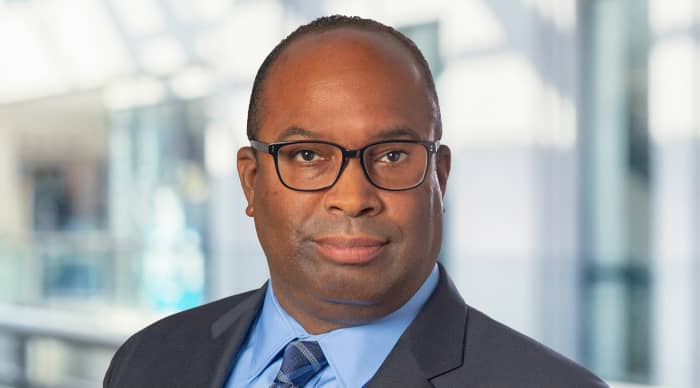 Headshot of Damian Hyams